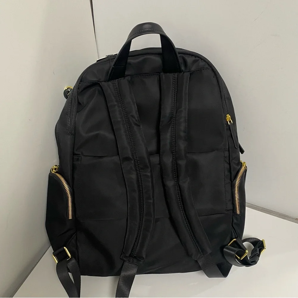 Tumi Black Backpack with Gold Zippers
